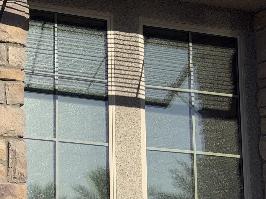 Before window cleaning — dirty hard water stained windows Las Vegas