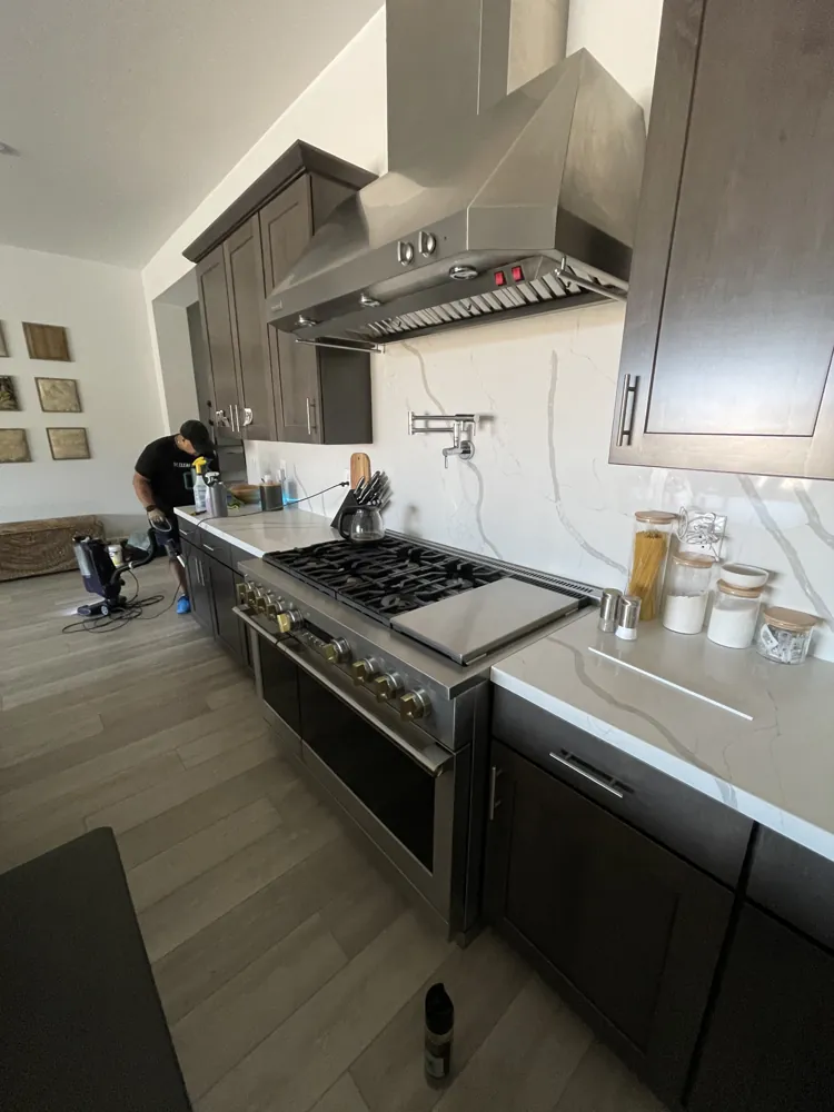The Clean Guys cleaning a modern Las Vegas kitchen